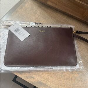 Coach wristlet in maple